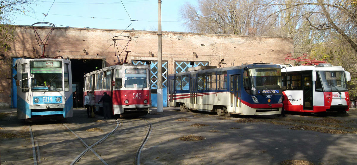 Мариуполь, 71-608К № 604; Мариуполь, 71-605 (КТМ-5М3) № 545; Мариуполь, К1 № 302; Мариуполь, 71-153 (ЛМ-2008) № 402