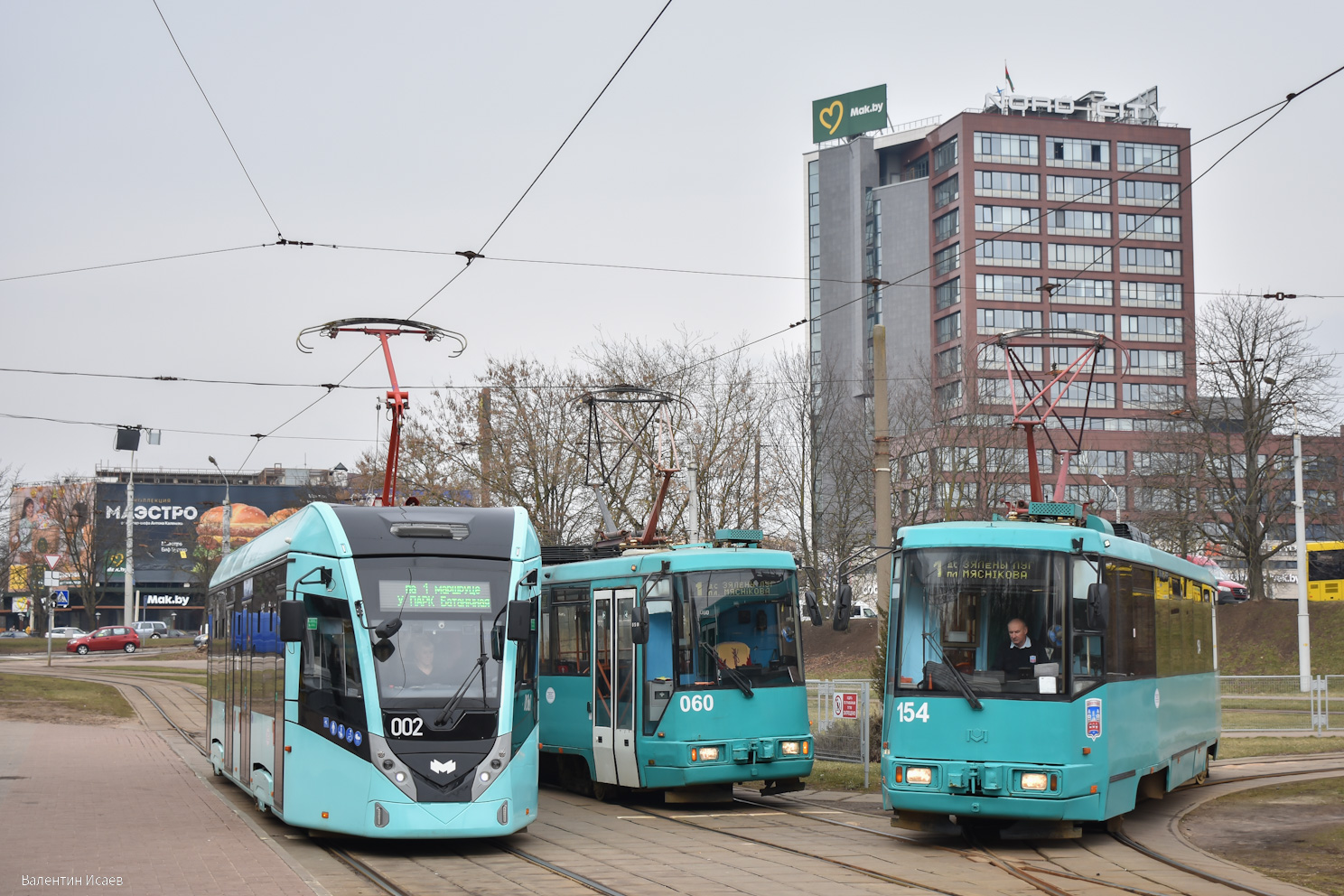 Minsk, BKM T811 č. 002; Minsk, BKM 60102 č. 154 Minsk, BKM T811 č. 002; Minsk, BKM 60102 č. 154